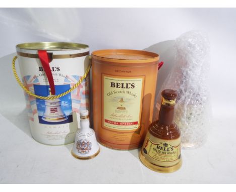Bell's Old Scotch Whisky - two Royal commemorative sealed decanters each containing 75 cl, 43% vol whisky of which one within