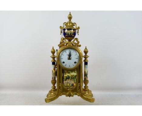 An Italian gilt metal and ceramic clock, white enamel dial with Roman numerals signed Imperial above a scene depicting figure