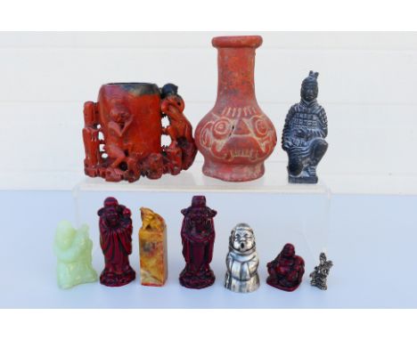 Lot to include a soapstone brush pot with monkey decoration, soapstone seal, various Chinese figures and similar. [W]
