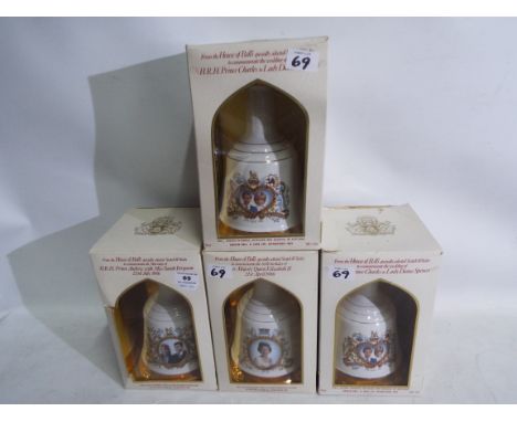 Bell's Old Scotch Whisky - four Royal commemorative sealed decanters each containing 75 cl, 43% vol whisky within original pr