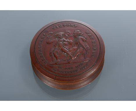 19TH CENTURY COMMEMORATIVE PRESSED WOOD SNUFF BOX 
for Victory, Trafalgar and Waterloo, decorated with two drinking figures, 