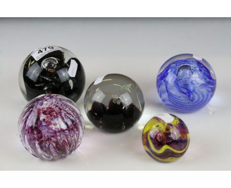 Five glass paperweights  Caithness Dragonfly,Mischief,Moon crystal,Optix and one other.