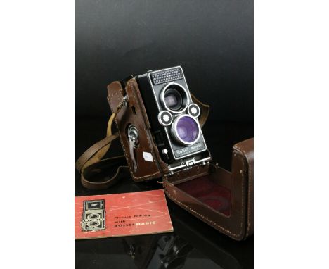 Rollei Magic twin lens reflex film camera with 75mm f3.5 Schneider Xenar lens and original leather case.