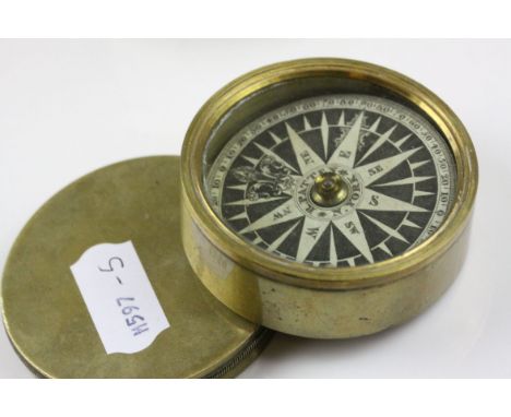 A brass cased compass marked R. Patten, N. York to the dial.