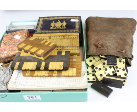 A collection of vintage gaming to include cards, poker dice, bone dominoes, whist markers and cribbage boards.