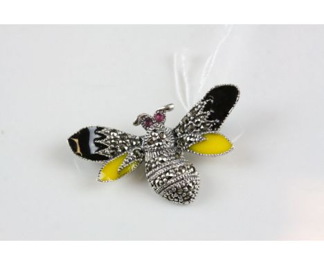 A silver and enamel bee brooch set with marcasites 