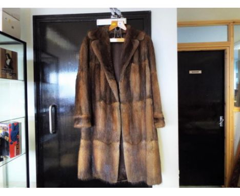 A vintage fur coat fully lined, three quarter length. Estimate £20 - £40