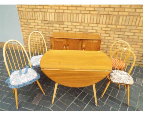 Ercol - an Ercol Windsor dining suite comprising sideboard 82 cm x 114 cm x 48 cm, drop leaf table 72 cm x 112 cm x 64 cm ext