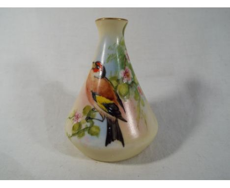 Royal Worcester / Locke & Co - a small solifleur vase of conical form handpainted with an image of a goldfinch on a blush ivo