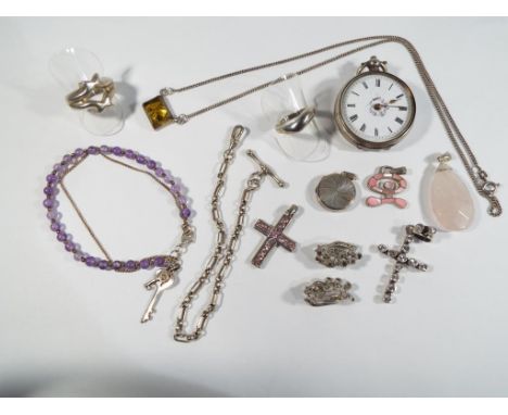 A lady's silver-cased pocket watch, white enamel dial with Roman numerals and floral decoration, on a silver chain, together 