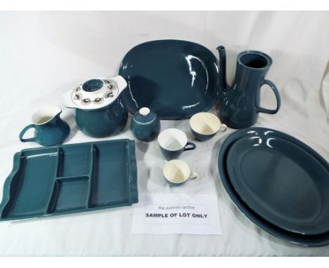 Poole Pottery - a tea service by Poole Pottery comprising 109 pieces in blue and white
