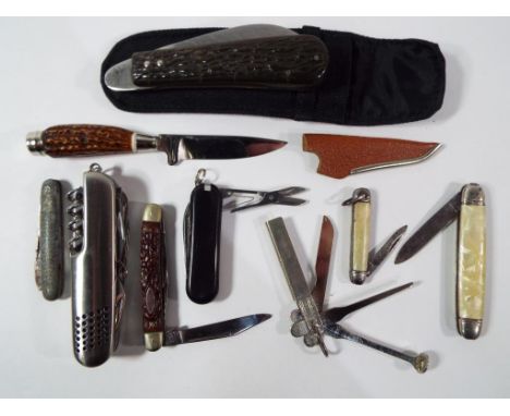 A very good collection of assorted knives including an Albert Oates of Sheffield pruning knife in nylon case, a Swiss style A