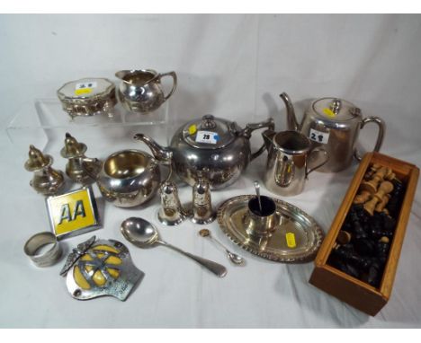 A quantity of good quality plated ware, A.A. car badges, napkin rings and a full set of wooden carved chess pieces, king meas