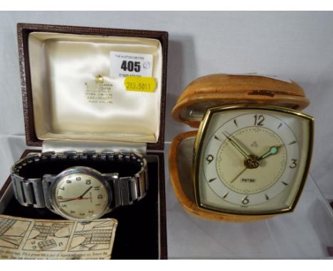 A gentleman's stainless steel cased Garrard wristwatch, presentation piece in 1966 for 20 years service at ICI, white dial wi