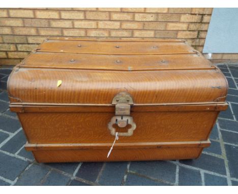 A large tin trunk
