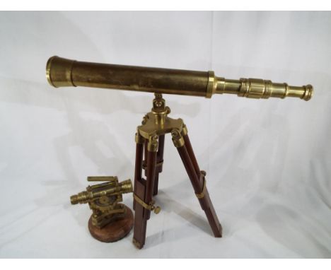 A brass telescope by Stanley on mahogany tripod support and a brass sextant (2) - Est £40 - £60