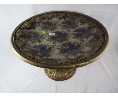A heavy large brass and ceramic centre piece 33cm (h) x 47cm (d) Est £30 - £60