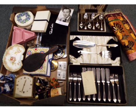 A good mixed lot to include a cased set of fish servers, a cased set of fruit spoons, a white metal trumpet vase with Indian 