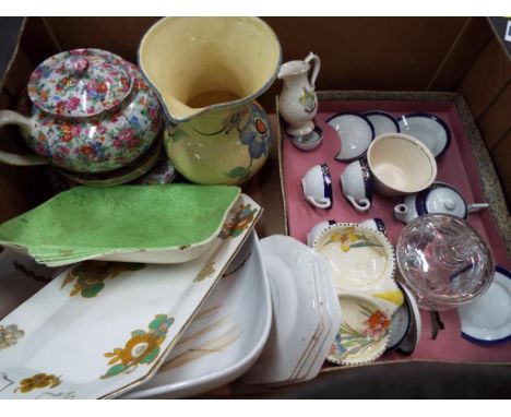 A good mixed lot of glassware and predominantly vintage ceramics to include a ceramic children's tea set, Goss crested ware, 