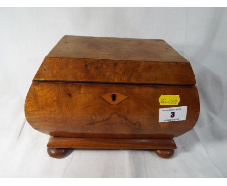 A good quality walnut tea caddy. Estimate £20 - £40