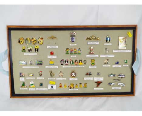 A collection of enamel pin badges to include Guinness, Pudsey bear, children's hospitals and similar. Estimate £30 - £50