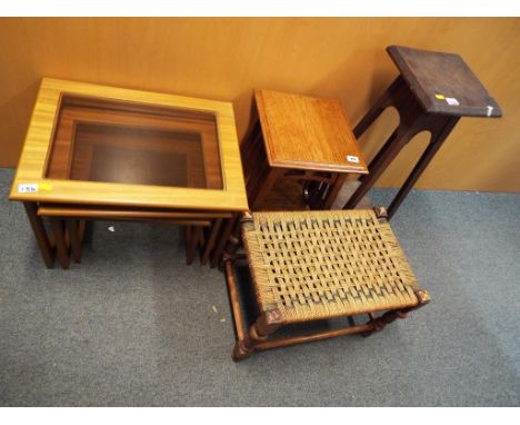 A retro style nest of three tables, an oak arts and crafts style plant stand / table and a wicker topped stool (qty)