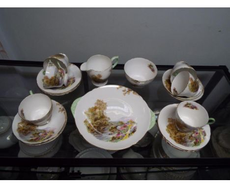 A collection of approx 21 pieces of ceramic tableware by Shelley in the 'Heather' pattern #13419