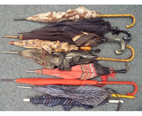 A quantity of nine vintage umbrellas