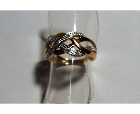 A lady's hallmarked 9ct gold and diamond ring, approx weight 1.8 grams, size K, boxed