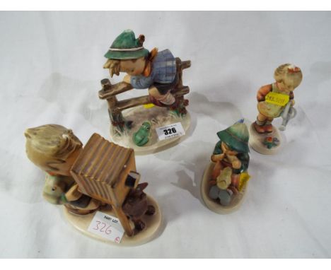 Four Goebel Hummel figurines