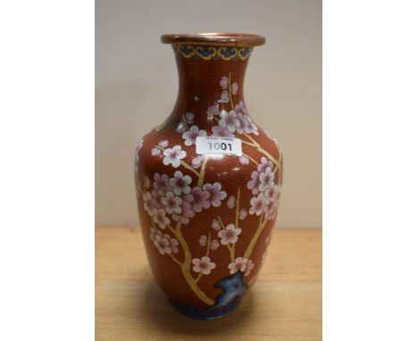 A Modern Chinese cloisonné enamel on copper vase, of baluster form and decorated with butterflies and blossoms 25.5cm sold to
