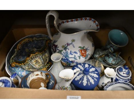 A Wedgwood Japserware tea caddy in deep blue, a selection of vintage Delftware brass and ceramic items including vase, footed