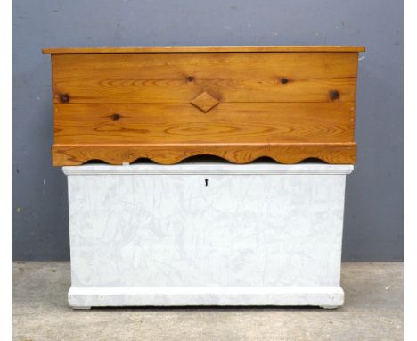 Painted pine trunk and another pine trunk 