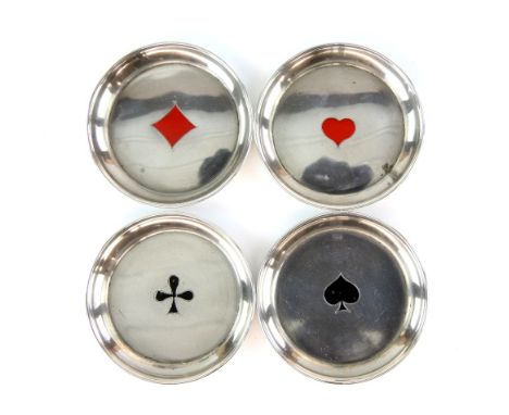 Set of four French silver and enamel dishes for bridge, each decorated with a suit of cards, 6 cm diam (4) 