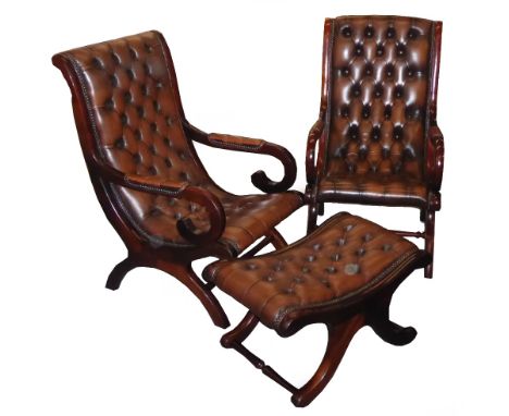 A PAIR OF GEORGIAN STYLE OPEN ARM CHAIRS, WITH BUTTON UPHOLSTERED BROWN LEATHER CONTINUOUS BACKS AND SEATS ON 'X' SHAPED SUPP