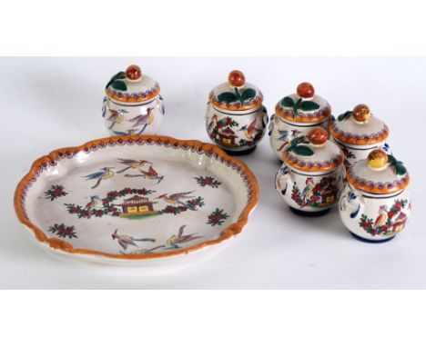 SET OF SIX PERRIER ET FILS, 3 Bd RASPAIL, PARIS, FRENCH FAIENCE POTTERY SMALL PRESERVE JARS AND THE MATCHING TRAY, painted in