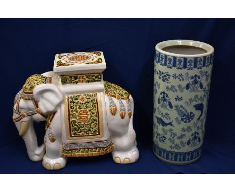 A ceramic elephant pedestal and an Oriental blue &amp; white stick stand (2)