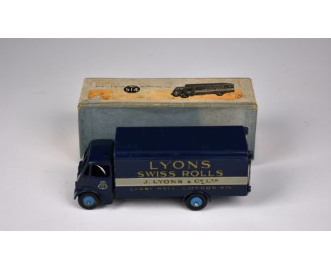 A Dinky Toys No 514 Guy Van Lyons Swiss Rolls dark blue with light blue ridged hubs and smooth tyres, van very good, original