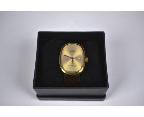 A 1970s gents Emile Pequignet manual wristwatch the rounded rectangular gilt sunburst dial without markers, signed 'EP Emile 