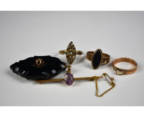 A Victorian jet, yellow gold and diamond mourning pendanttogether with a Victorian 14ct gold and rose cut diamond navette sha