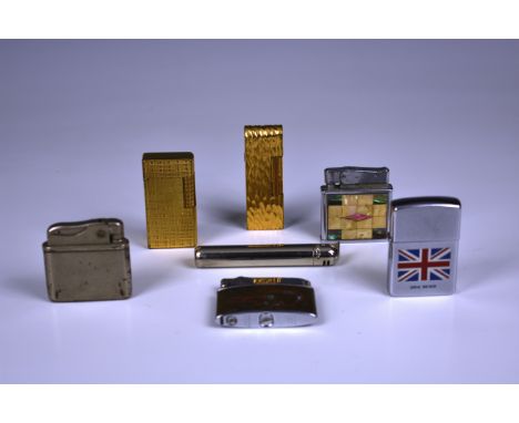 Two vintage Dunhill lighters the first of rectangular rounded form with bark effect gold tone case and dark red lacquer sides