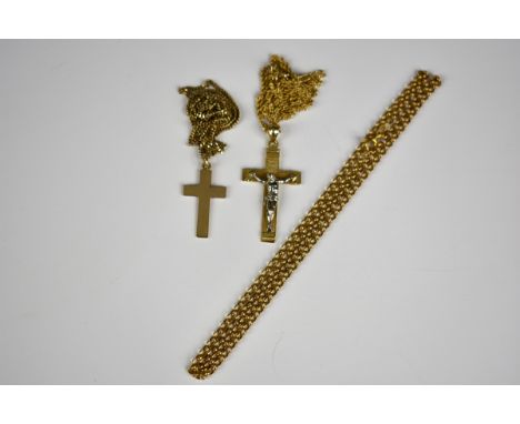 A 14ct gold crucifix on 14ct rope twist chaintogether with a 9ct gold cross and chain; and a 9ct gold link chain. (3) 
