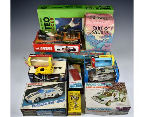 A collection of vintage toys comprising of A boxed Subbuteo Table Football game; Corgi (191) Texaco-Marlboro McLaren M23F1; b