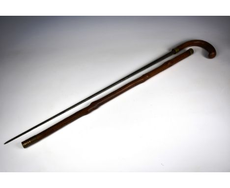 A Victorian customs officer's crook top sword stick walking cane by Mole of Birmingham the briar cane with brass mounts and r