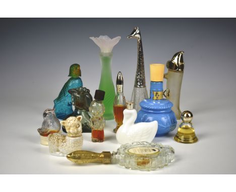 A group of vintage collectable Avon cologne bottles comprising of Giraffe; Dashhond; Lamb; Bird; Eagle; Swan; Donkey; boy; Mi