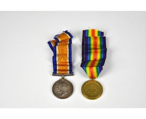 A pair of WWI Guernsey Light Infantry Victory and War Medals with ribbons awarded to 121 PTE. T. MARTEL. R. GUERNSEY. L.I. 
