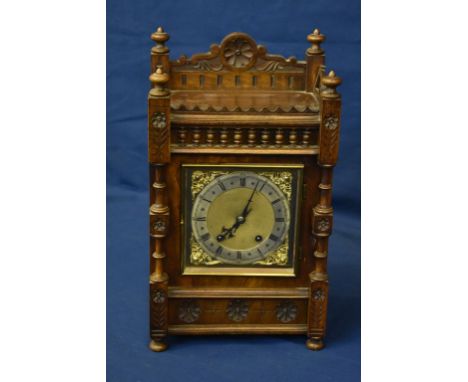 A Winterhalder &amp; Hofmeier walnut case clock with German movement.