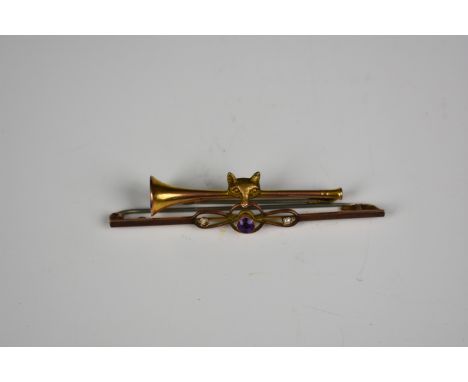 A 9ct gold fox and hunting horn brooch or tie pin 4.6cm. long; together with a 9ct rose gold, amethyst and seed pearl bar bro