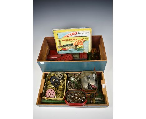 A large quantity of vintage Meccano loose, contained in wooden drawer with lift out tray, together with Meccano magazines and