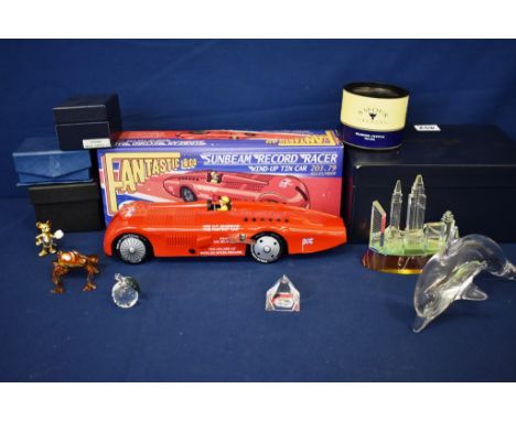 A Fantastic & Co. reproduction tinplate clockwork Sunbeam Record Racerboxed; together with a Fineline crystal Manhattan skyli